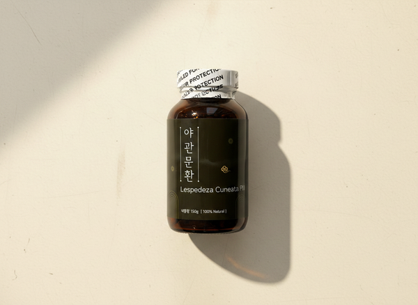 Yagwanmun-hwan Lespedeza Cuneata pills, amber bottle black label